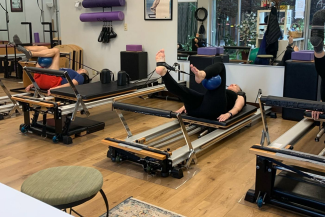 Pilates reformer for core strength